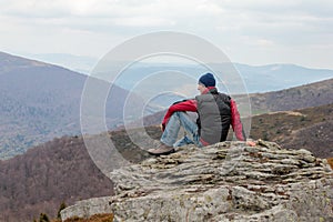 Tourists climb to the top of Runa mountain in Carpathians