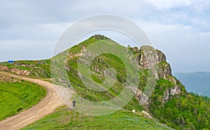 Tourists climb up holy mountain Khacha Gaya in western Azerbaijan