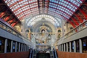 Tourists and commuters in the beautiful historic Antwerp Central train station