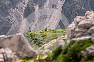 Tourists in dolomites valley, Italy