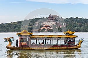 Tourists on a dragon boat at the Summer Palace