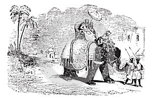 Tourists on an elephant ride, vintage engraving