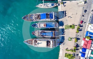 Tourists embarking on daily cruise ships in Nikiana Lefkada Greece photo