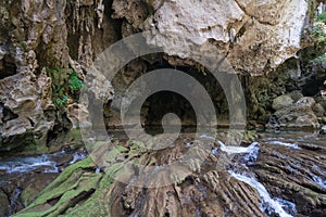 Tourists enjoy adventure in Lam Khlong Ngu cave at National Park Kanchanaburi Thailand