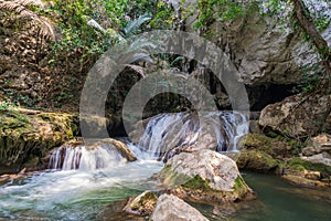 Tourists enjoy adventure in Lam Khlong Ngu cave at National Park Kanchanaburi Thailand