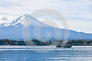 Tourists enjoy freely view Mt.Fuji from the pleasure boat at the