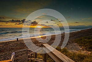 Tourists Enjoying a Florida Sunrise on the Beach