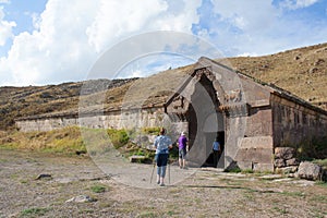 Tourists enter the caravan shed. Selim Vardenyats pass.