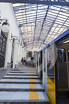 Tourists entering the funicular at Atan Stazione Funicolare Centrale