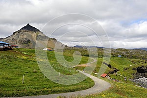 Tourists exploring the Icelandic volcanic landscape