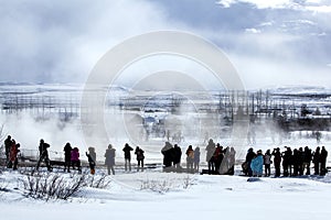 Tourists at the famous geyser Strokkur, Iceland