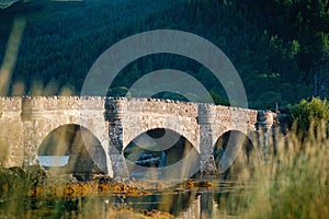 Tourists favourite place in Scotland - Isle of Skye. Very famous castle in Scotland called Eilean Donan castle. Scotland green nat