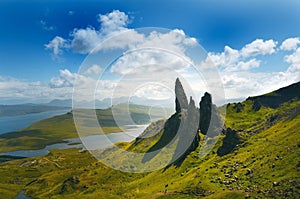 Tourists favourite place in Scotland - Isle of Skye. Very famous castle in Scotland called Eilean Donan castle. Scotland green nat