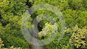 tourists float on a rubber boat along the martvili canyon Georgia