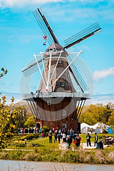 Tourists flocking to De Zwaan windmill in Holland Michigan during tulip time