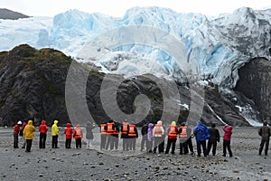 Tourists at the foot of the Aguila glacier. Tierra Del Fuego