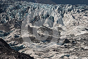 Tourists on Fox Glacier in Westland National Park