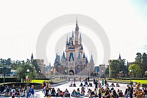 Tourists at the front of Cinderella Castle Tokyo Disney Resort in Urayasu, Chiba prefecture, Tokyo, Japan