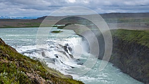 Tourists at the Gullfoss Waterfall on the Hvita River, Golden Circle, Iceland