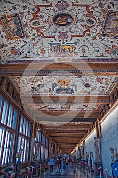 Tourists in hallway of the Uffizi Gallery in Florence