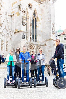 Tourists having Segway sightseeing photo