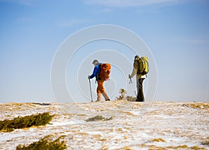 Tourists Hiking in the mountains.