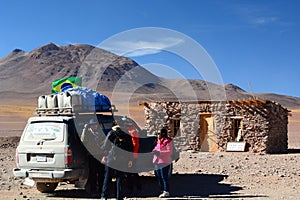 Tourists at Hito Cajon. Border between Chile and Bolivia. Andes