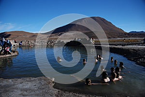 Tourists inside hot springs