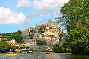 Tourists kayaking on river Dordogne in France.