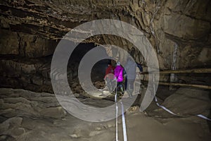 Tourists in the Krizna cave in Slovenia