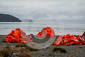 Tourists left safety jackets ashore during walking shore excursion when disembark from cruise ship `Ventus Australis` photo