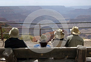 Tourists looking at Grand Canyon