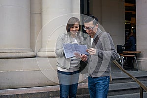 Tourists looking at map