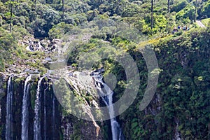 Tourists looking to Waterfall at Itaimbezinho Canyon