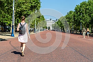 Tourists at The Mall facing the Admiralty Arch in London photo