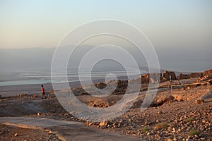 Tourists in Masada looking at Dead Sea