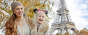 Tourists mother and daughter in Minnie Mouse Ears in Paris