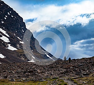 Tourists in a mountain pasage