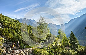 Tourists on mountain trail in High Tatra Mountains