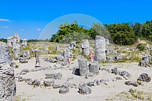 Tourists in the natural phenomenon Pobiti Kamani