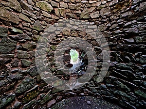 tourists at the old castle fell into the famine. the view from the well up to