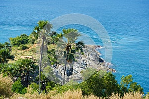 Tourists at Phromthep cape viewpoint at the south of Phuket Island, Thailand. Tropical paradise in Thailand. Phuket is a popular