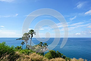 Tourists at Phromthep cape viewpoint at the south of Phuket Island, Thailand. Tropical paradise in Thailand. Phuket is a popular