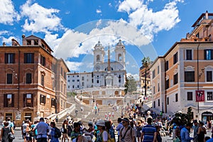 Tourists on Piazza di Spagna at the bottom of the Spanish steps in Rome, Italy