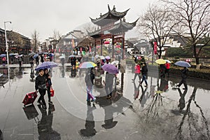 Tourists in the rainy days of Confucius Temple Scenic Spot