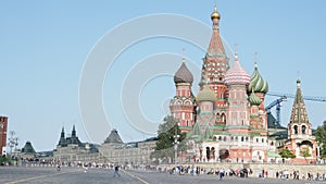 Tourists on Red Square near Vasily the Blessed Cathedral in Moscow