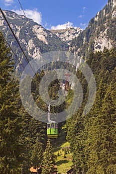 Tourists ride the cable car