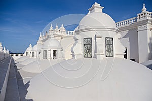 Tourists on the roof of the white cathedral of Leon in Nicaragua.