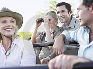 Tourists On Safari In Jeep