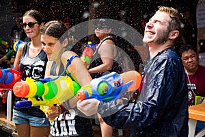 Tourists Shooting Water Guns at Songkran Festival in Bangkok, Th